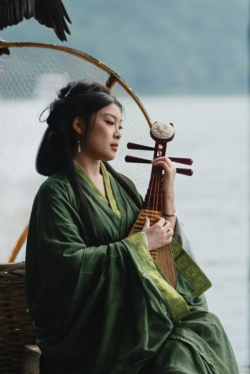 A young asian girl in a traditional dress