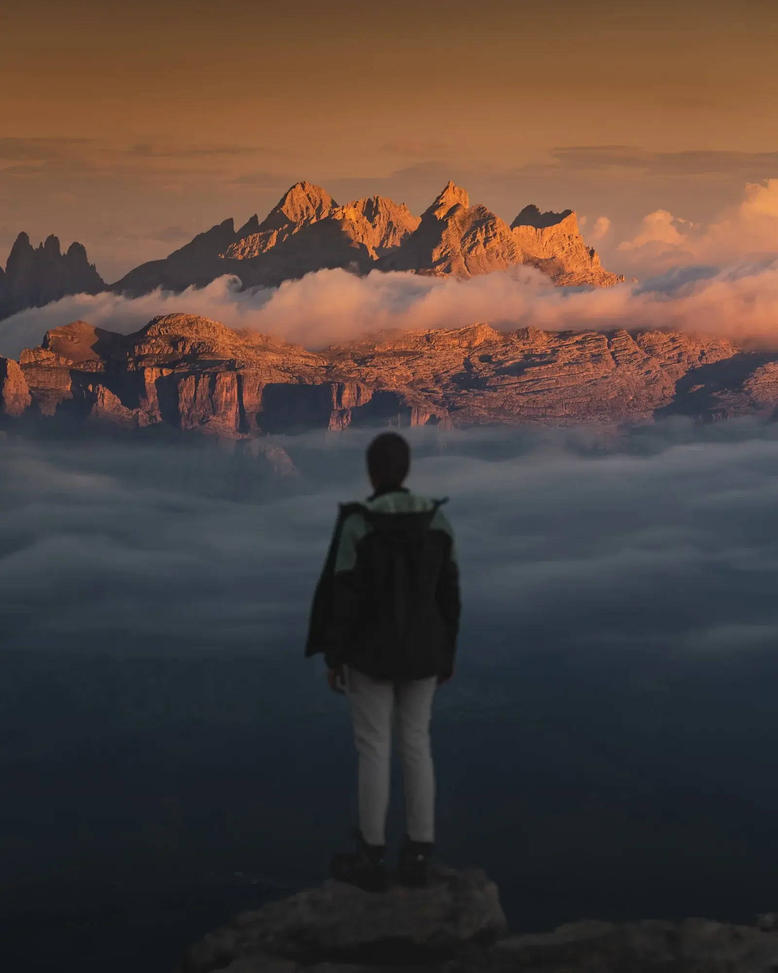 Timeea looking over the Dolomites on a foggy morning